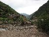Sichuan: Xiaojin Xian. SW of the city of Xiaojin at Shalong Xiang. Riverbed scoured clean of vegetation by recent flood.