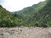 Sichuan: Xiaojin Xian. SW of the city of Xiaojin at Shalong Xiang. Riverbed scoured clean of vegetation by recent flood.