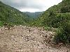 Sichuan: Xiaojin Xian. SW of the city of Xiaojin at Shalong Xiang. Cleanup of riverbed scoured clean of vegetation by recent flood.